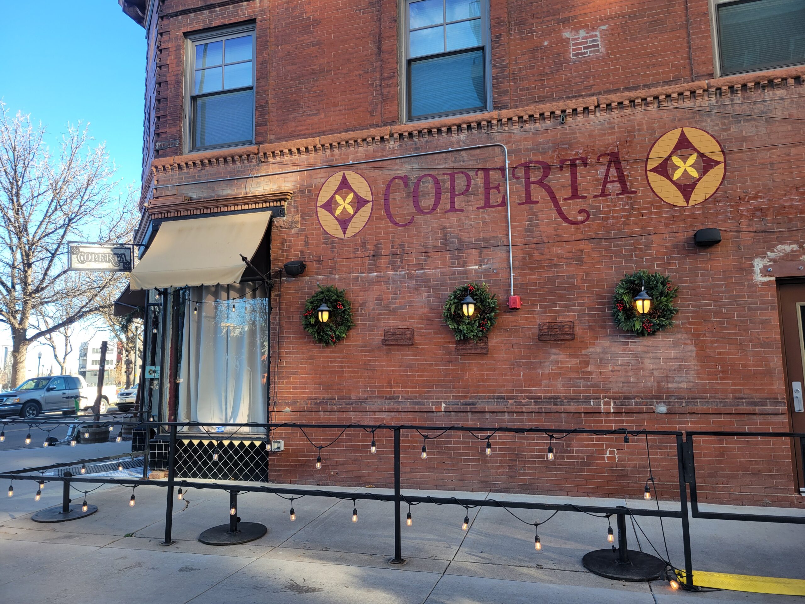 brick building with coperta logo